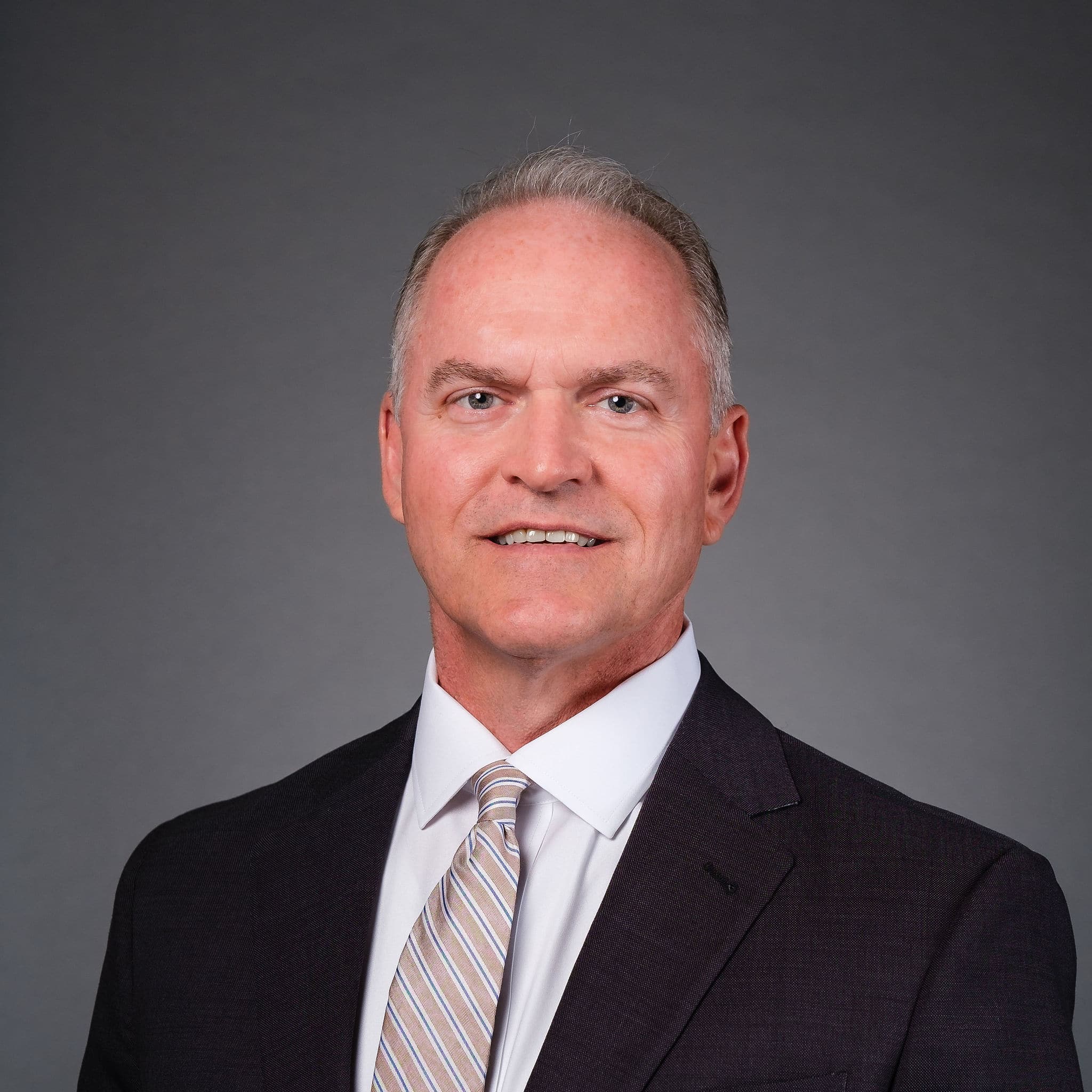 Professional photo of Tim Garrett, Chief Operating Officer