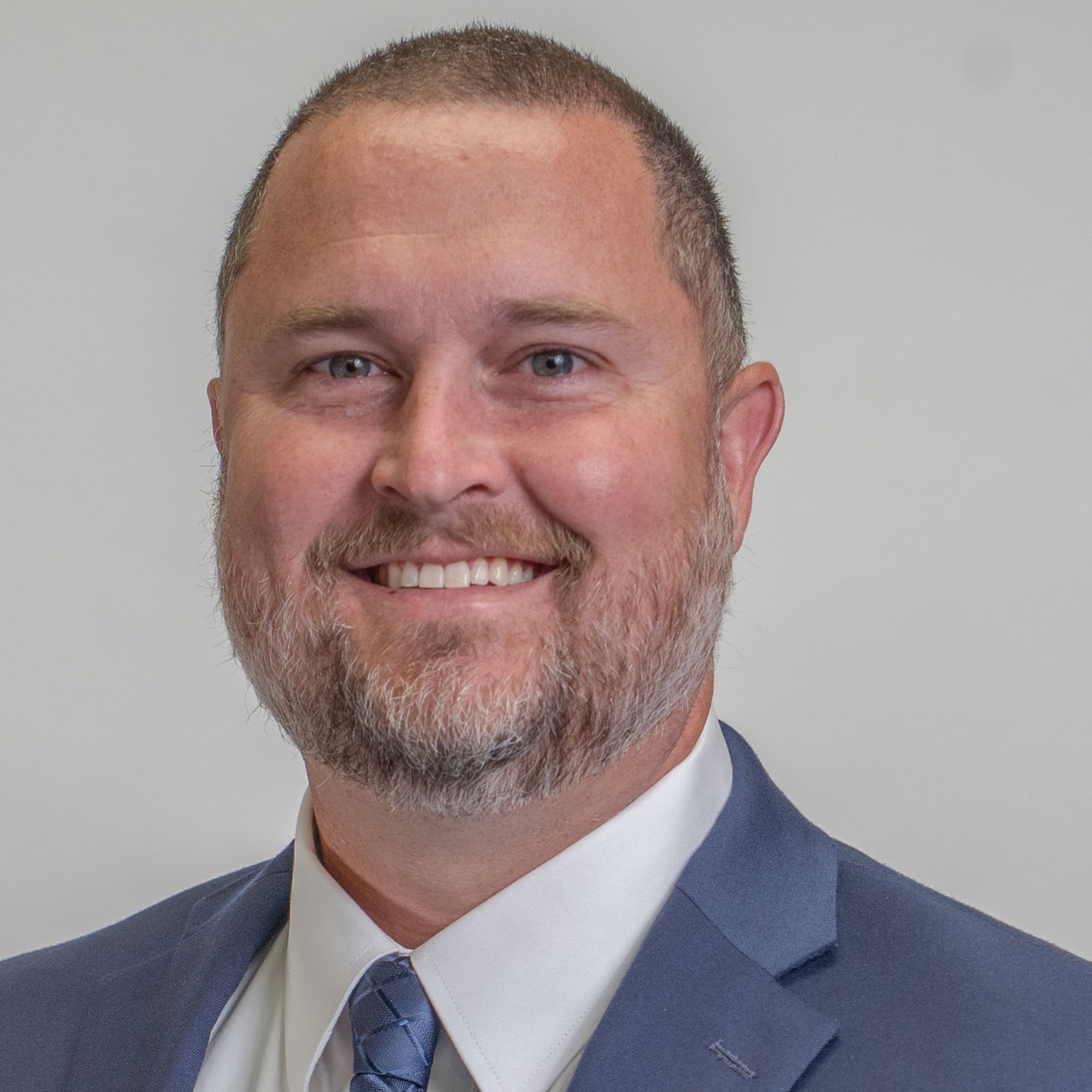 Professional photo of Justin Hall, FDOT District 7 Secretary and THEA Board Member