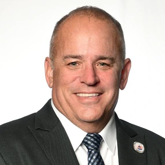 Professional headshot of Chris Boles, Hillsborough County Commissioner and THEA Board member